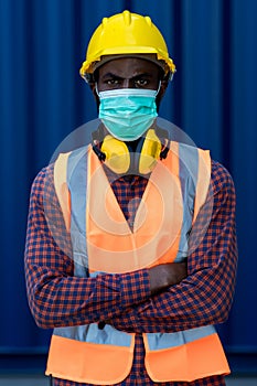 Man with protective mask before work. Man putting on medical face mask. Man wearing an anti virus protection mask to prevent other