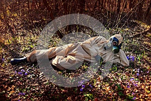 man in protective suit, mask in forest