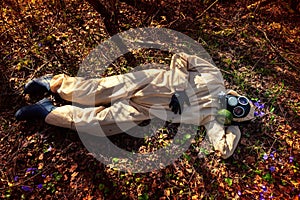 man in protective suit, mask in forest