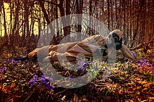 Man in protective suit, mask in forest