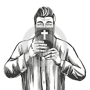 Man protects his face with the Bible , salvation is in God `s word, hands holding the Holy Bible, gospel, symbol of