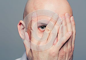 Man pry portrait hands close face