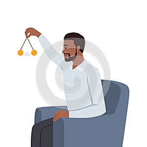 Man psychotherapist hypnotizes patient using pendulum to solve psychological problems