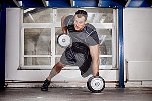 Man pull up barbell crossfit fitness training