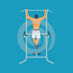 Man pull-up up on horizontal bar in gym