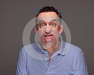 Man Pulling Face Sticking Out Tongue