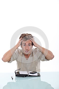 Man pulling his hair out