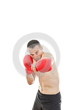 Man punching with red boxing gloves isolated on white background