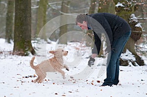 Man with puppy