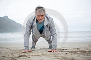 Man push-up on beach