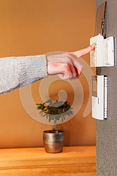 Man pushing button home appliance