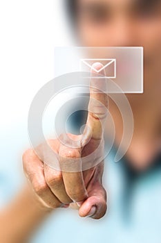 Man pushing email icon