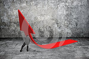 Man pushing red trend 3D arrow up