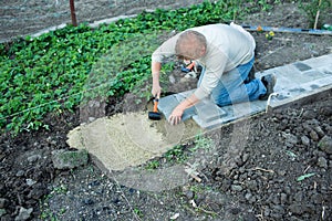 Man puts paving