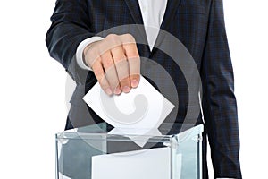 Man putting ballot into voting box isolated on white background