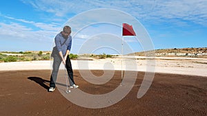 Man Putting at Coober Pedy Golf Course
