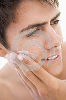 Man putting on shaving cream