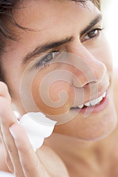 Man putting on shaving cream