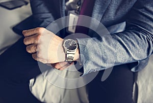 A man putting on a watch