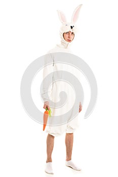 Man in a rabbit costume on white background