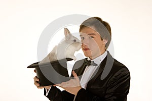 Man with a rabbit in a silk top hat