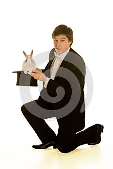 Man with a rabbit in a silk top hat