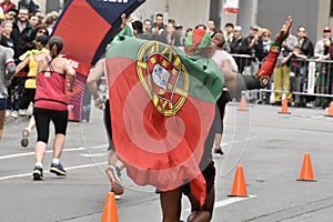 Man racing with Portugese flag