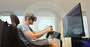 Man racing in VR headset