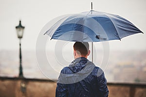 Man in rainy day