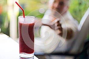 Man Reaching For Frozen Drink