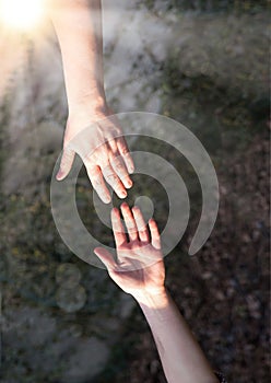 Man reaching out to help his friend