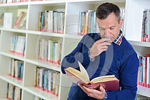 man reading book