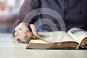 Man reading book close up view