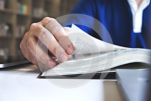 Man reading a book. Education, Academic, Learning and Exam concept.