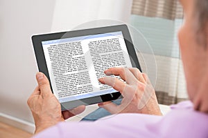 Man reading ebook