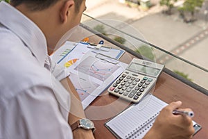 Man reading financial documents