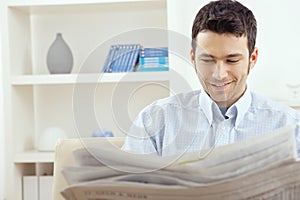 Man reading newspaper