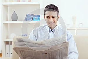 Man reading newspaper