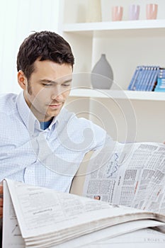 Man reading newspaper