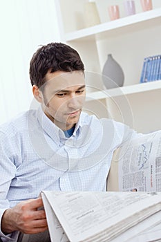 Man reading newspaper