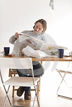 Man is reading Newspaper