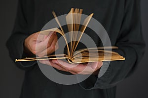 Man reading old book