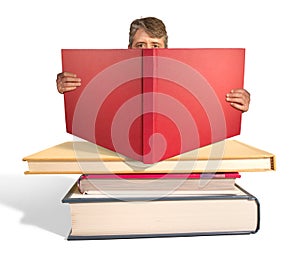 Man reading the stack of big books