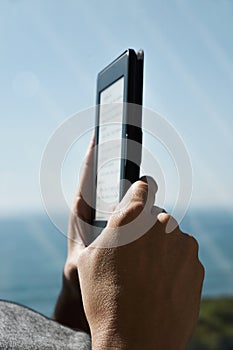 Man reading in a tablet or e-reader