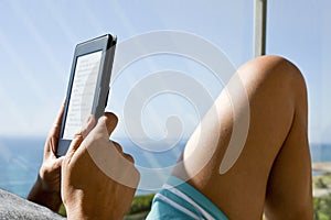 Man reading in a tablet or e-reader