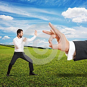 Man ready for fight with big flick