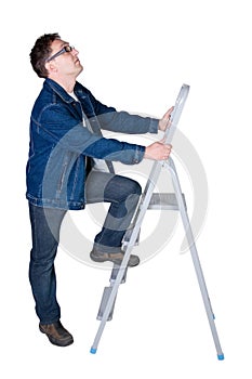 Man ready to climb a ladder