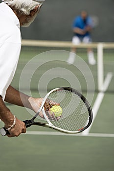 Man Ready To Serve A Tennis Ball