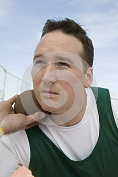 Man Ready To Throw Shot Put