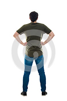 Man rear view hands on hips